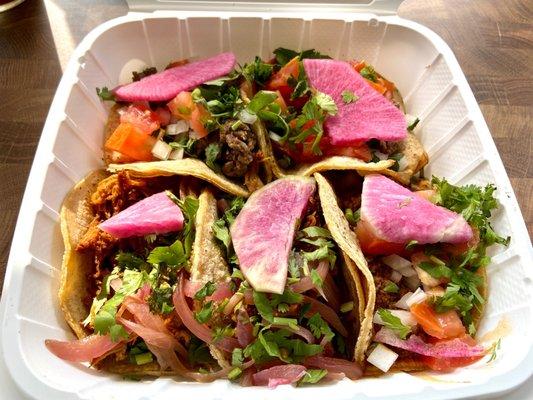 Taco box - 2 Asada, 2 Pibil, 1 Ground Beef Pink radish is pretty garnish, but no taste.  Stick with the burritos!