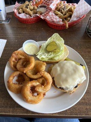 Classic Hamburger with no onion and no tomato upgraded to onion rings.