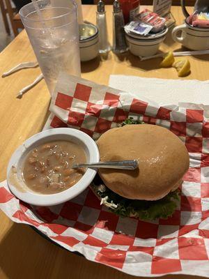 A burger and supposedly vegetables