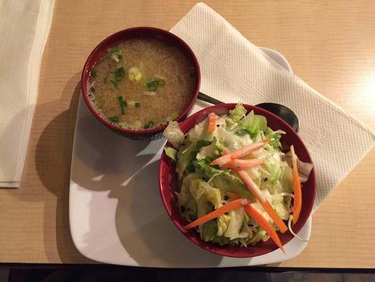 Miso soup and salad that comes with the bento box