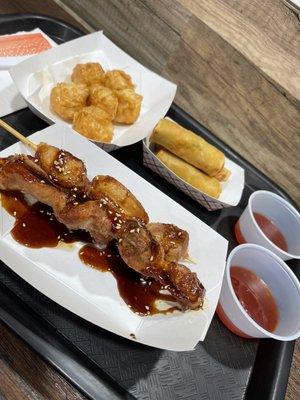 Shrimp Shumai, vegetable spring rolls, chicken yakitori