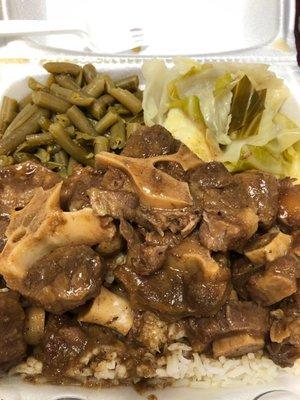 Oxtails, cabbage and greens