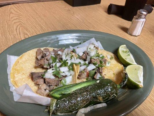 Lengua and chicharron tacos