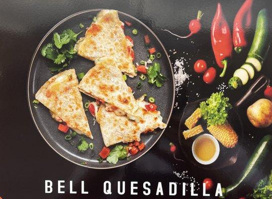 Bell Quesdilla come with onions and jalapeños with our in house BELL SAUCE.