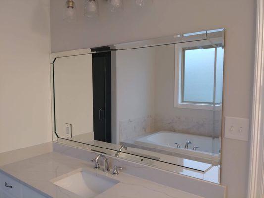 Bevel strips added to mirror. Add some luxury to your bathroom.