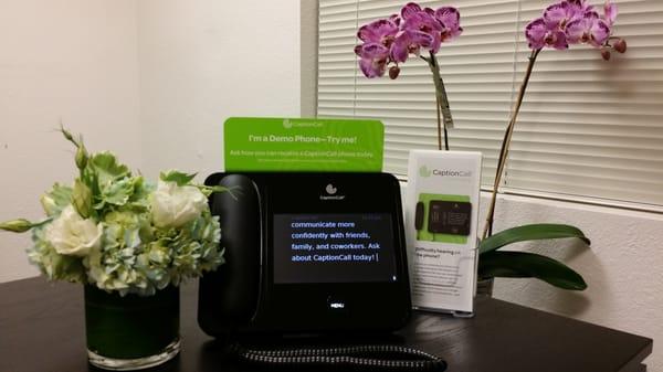 Caption Call demo phone at Lamorinda Audiology reception.