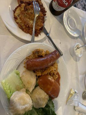 Polish platter (Polski talerz)  Potato pancakes, pierogi, stuffed cabbage, kapusta, and polish sausage