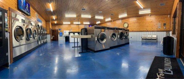 Dryers to the left. Washers to the right. Seating area available