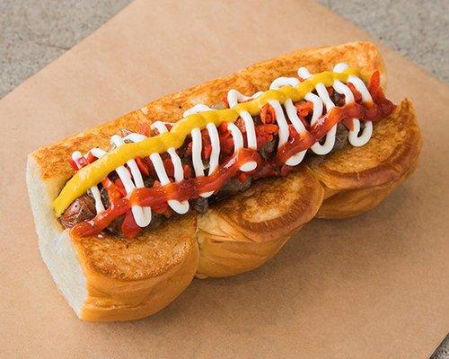 DOWNTOWN - smoked bacon wrapped dog, caramelized onions, pickled peppers, mayo, mustard, ketchup