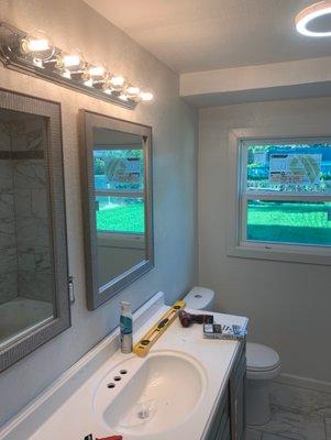 Bathroom Remodel with Installation of lighting and Mirrors