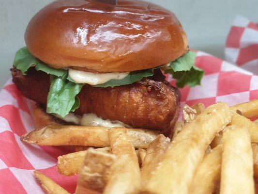 The Codfather - Our hand dipped cod fillet topped with lettuce, tomato and our house made tartar sauce.