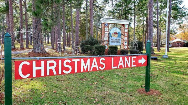 Christmas decor near pedestrian entrance to GREATEST GENERATION MEMORIAL PARK in Thomaston, Georgia.