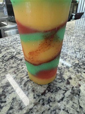 Mango, liquid marijuana ( not marijuana),  & strawberry. Tajín and chamoy.