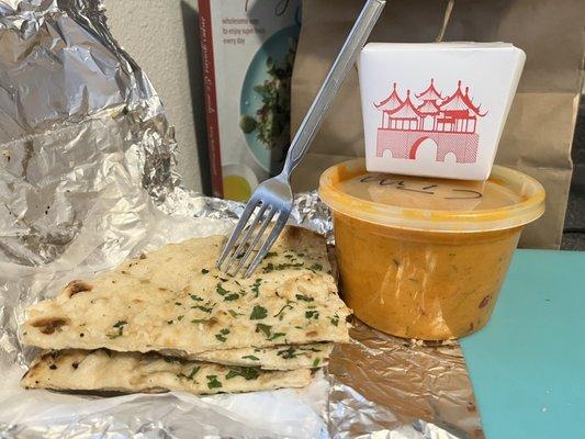 Garlic naan, chicken tikka masala, tiny basmati rice. $30 worth of take out.