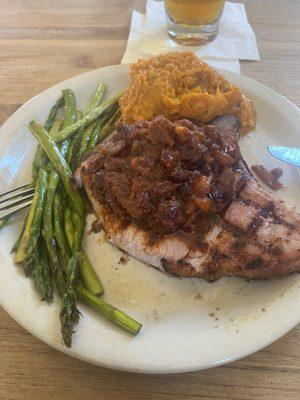 Smoked pork chop with apple chutney, sweet potatoes and asparagus