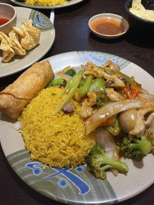 Spicy Chicken with Garlic Sauce with pork fried Rice and Egg Roll. Part of the Combination Plate