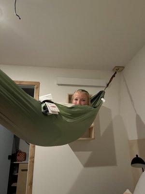 Hammock above bed