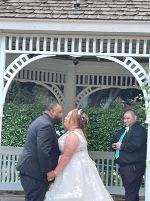 My husband and I renewing our vows in the Rose Court, Garden