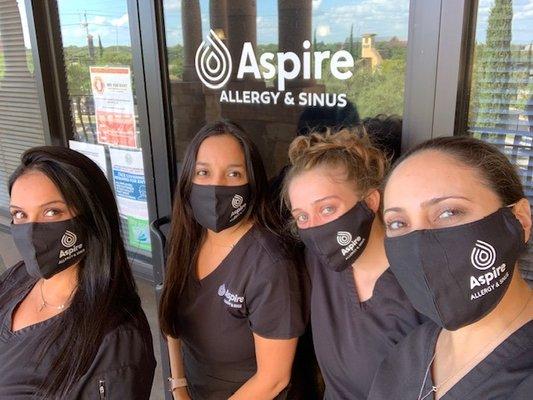 Team wearing Aspire masks