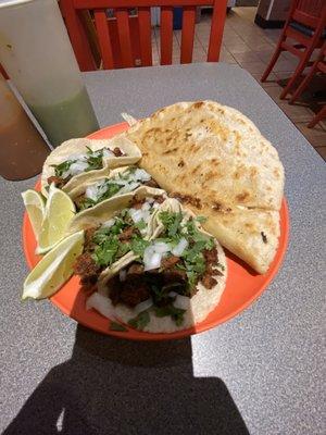 Chorizo tacos and a chicken quesadilla