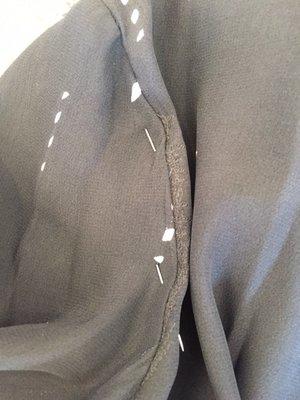 Both sides were done terribly. Very visible and the pins in there are from another tailor determining how to fix it.