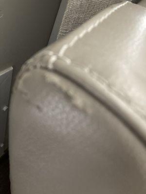 Leather sofa side torn