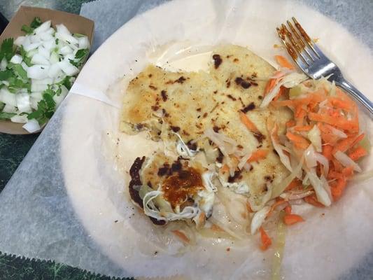 Pupusa con Queso (Cheese) topped w/ curtido (pickled cabbage & carrot mix). Delicious!