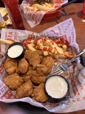 Boneless wings and fries.