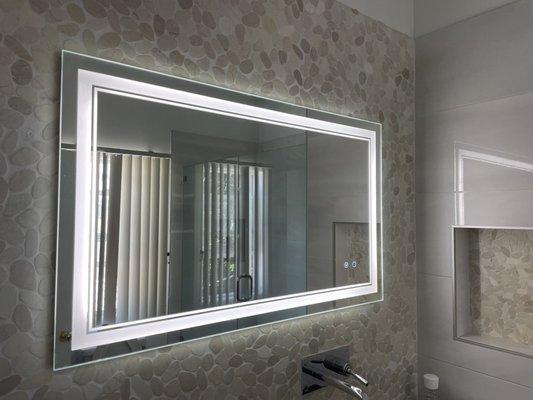 Lighted bathroom mirror