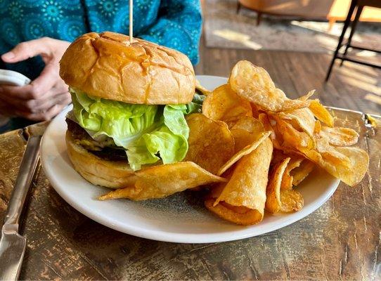 Hewing Burger (double patty, white American cheese, buttered onion, Fhima brioche) with house spiced chips and dip. $16