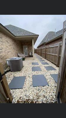 Beautiful hardscape ! We took out the grass due to floods when it rains so we added hardscape so it drains to the front