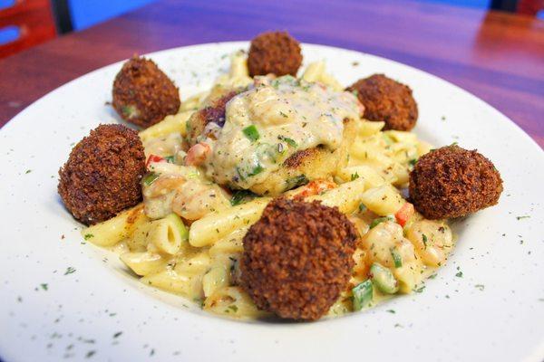 Crabby Seafood Pasta (shrimp + crawfish pasta,  crawfish and crabcake and 6 crabcakes balls covered in Peewee's signature lump sauce)