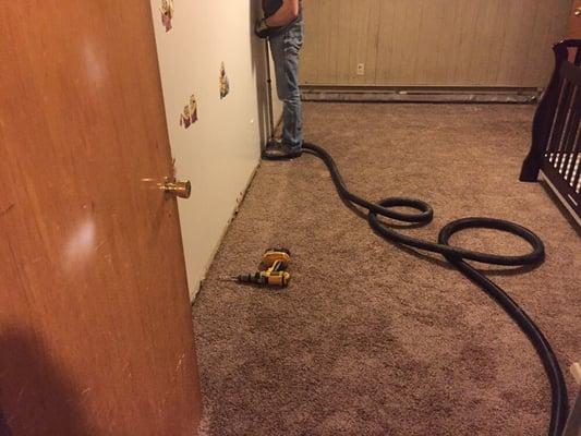 Pipe froze and flooded basement bedroom. Extracted water, pulled base boards and set drying equipment