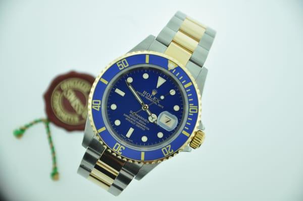 Best of ROLEX..."SUBMARINER" in 18Kt yellow gold and S.Steel