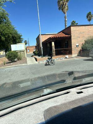 Vacant wheelchairs in parking lot