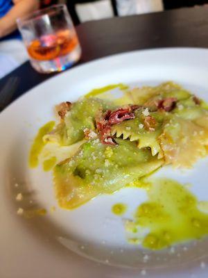 Agnolotti with English pea and Ricotta- Pancetta, Grana Padano, and Mint oil ($18 or $28 for full.) Excellent pasta.