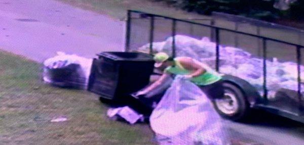 My video camera showing him dump the can in my yard.