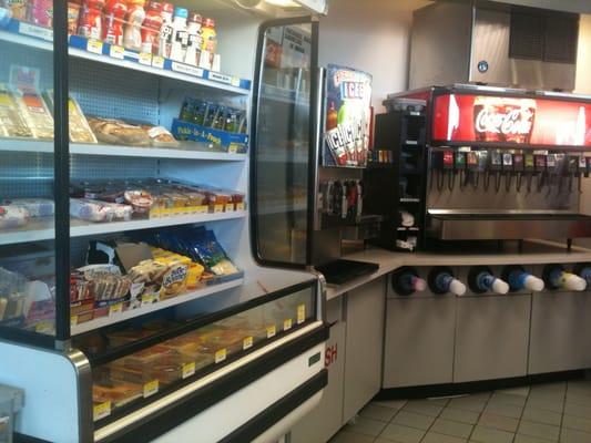 Pre made burritos and drink fountain. Also has icee machine!