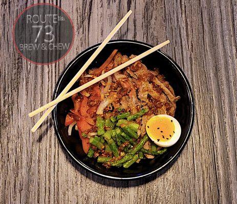 Asian Steak Noodles:
Seared Steak, Steamed Asparagus, Red Peppers, Black Sesame Seed, & Soft Boiled Egg over Japanese Noodles