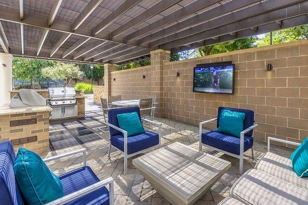 Pool-side grill kitchen and TV lounge