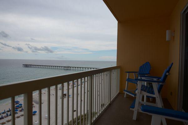 (903W) Bar height chairs of the balcony to enjoy the sunrise or sunset.