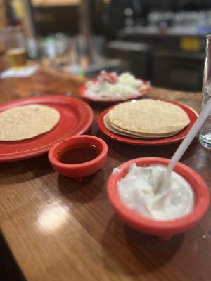 Tostadas, sour cream and chili oil