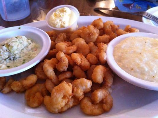 Popcorn shrimp with coleslaw & grits.