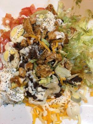 La Fogata salad with fajita steak and chicken.