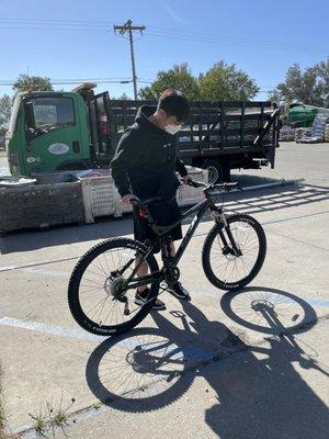 A very happy customer with a new mountain bike built by Nick