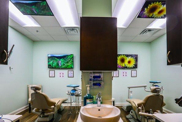 Treatment rooms.. Yes, we do have TVs on the ceiling with a variety of Netflix shows to choose from. :)