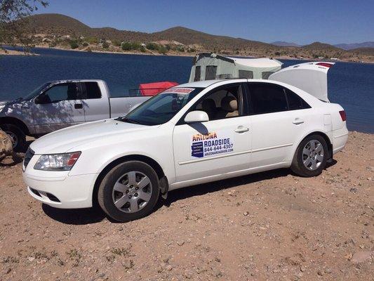 Changing a tire on a pop up camper @ Lake Pleasant