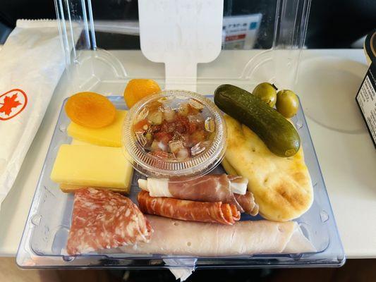 We received two entrees and four snacks complimentary: Charcuterie shown (normally $15.95 C$) good bc it was free