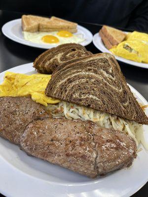 Steak and eggs with marbled rye toast