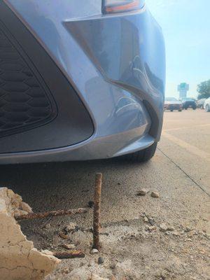 Damaged curb and my bumper